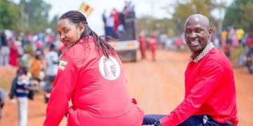 MP Brenda Nabukenya and Bamunanika County MP Robert Ssekitoleeko ride atop a vehicle during NUP presidential candidate Robert Kyagulanyi’s procession to a rally in Nakasongola.