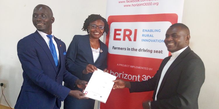 Banio Luiji Nobert (in blue coat), Sharon Namboozo (centre), and Rev. Fr. Gonzaga Kiyimba during the launch of the Youth Training Manual in Masaka City.