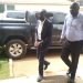 Ssekikubo escorted by detectives to court.