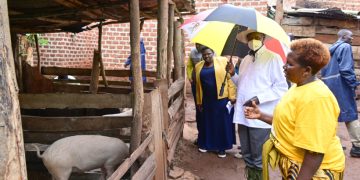 President Yoweri Museveni and Rose Namayanja Nsereko, the Deputy Secretary General during PDM tour in Luwero in May this year.
