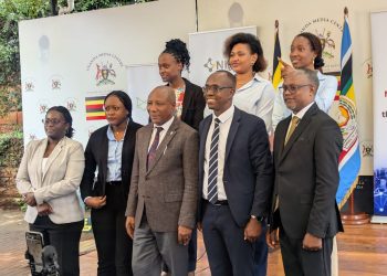 Officials from the National Information Technology Authority-Uganda and the Ministry of ICT, led by Godfrey Baluku Kabbyanga, pose for a group photo after unveiling the National IP Peering Exchange (NIPX) at the Uganda Media Centre.