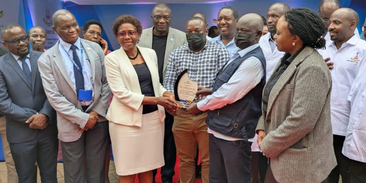 Health Minister Jane Ruth Aceng commends the medical team at the Uganda Cancer Institute following the successful bone marrow transplant.