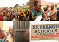 School director Fred Kafumbe is seen blocking residents from entering St. Francis Schools Naggalama during the tense confrontation over a disputed access road