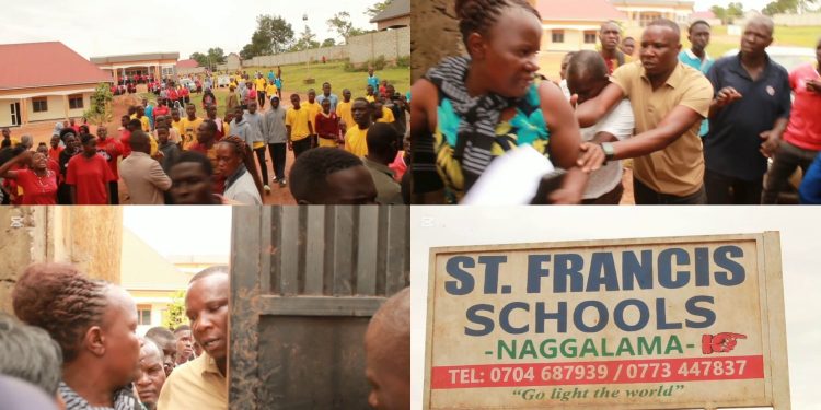 School director Fred Kafumbe is seen blocking residents from entering St. Francis Schools Naggalama during the tense confrontation over a disputed access road