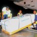 State Minister for Youth and Children Affairs Balaam Barugahara and family members receive the body of Timothy Muganzi Magambo, son of CID Director Tom Magambo, upon arrival at Entebbe International Airport on Tuesday morning.