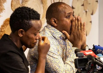 Activists Boniface Mwangi (right) and Agather Atuhaire (left), who allege they were sexually assaulted while in detention in Tanzania last year. (File photo)