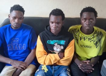 From left to right are Hassan Mugoya, Ashiraf Kyakatuka and Asuman Isanga detained at Iganga Central Police Station over alleged impersonation