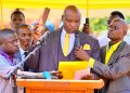 Francis Lukooya Mukoome takes oath during his swearing-in ceremony as Mukono District LC5 Chairperson.