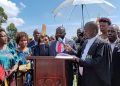 Ronald Kasekende takes oath of office during the swearing-in ceremony for newly elected leaders at Sport Arena Grounds in Kitovu, Masaka City.