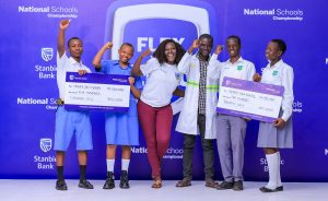 Some of the regional finalists from Eastern Uganda post for a group photo during the last day of Stanbic National Schools Championship bootcamp session at Gayaza High School, Wakiso District.
