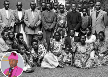 Bishop Misaeri Kauma during a visit to Namugongo Church in an undated photo. Rev. Godfrey Bazira is third from the right in the front row standing while the circled figure is Archbishop Stephen Kaziimba Mugalu.