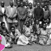 Bishop Misaeri Kauma during a visit to Namugongo Church in an undated photo. Rev. Godfrey Bazira is third from the right in the front row standing while the circled figure is Archbishop Stephen Kaziimba Mugalu.