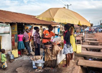 A food vendor operating close to a road or walkway.