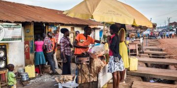 A food vendor operating close to a road or walkway.