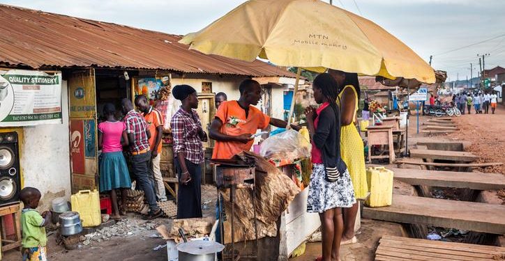 A food vendor operating close to a road or walkway.