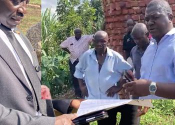 Njeru Municipality Deputy RDC Richard Kakwezi and Njeru Municipality Planner Edmond Musoke at Kilyowa Village in Njeru Municipality Buikwe District.
